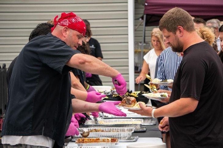 Chef Todd serving on Bastille day